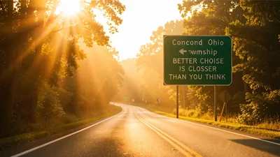 A rural road with a highway sign pointing toward Concord Township