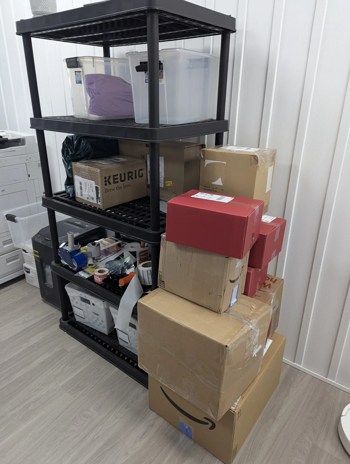 The commercial copier and print station in the back room at Mailbox Plus in Concord Township, Ohio, where invoice batches get printed before the envelopes get stuffed